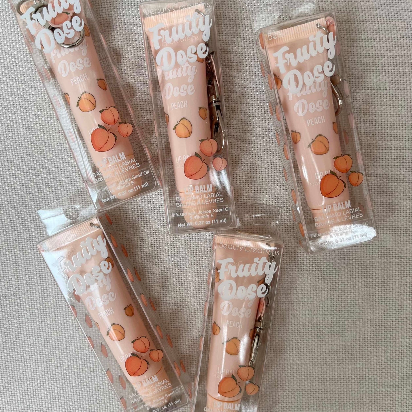 BEAUTY CREATIONS FRUITY DOSE BÁLSAMO LABIAL CON LLAVERO